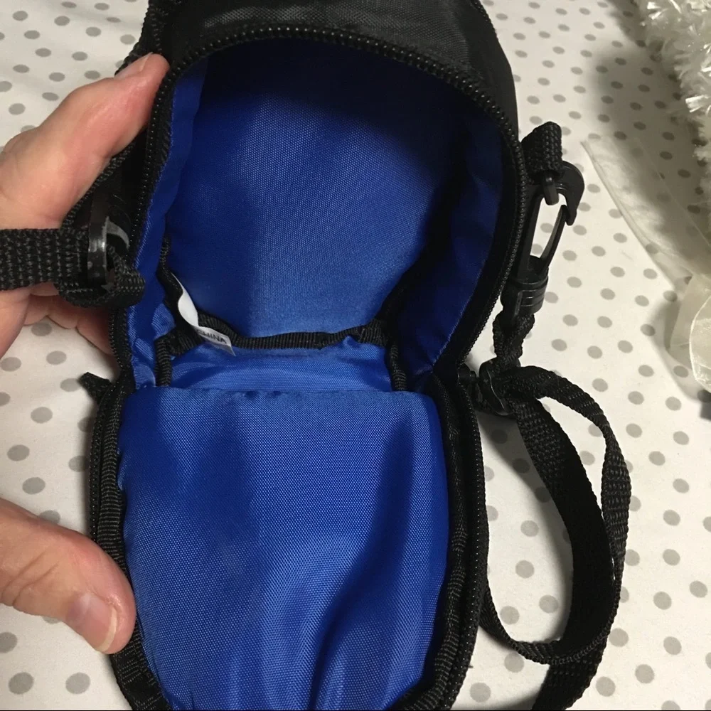 Case Logic Small black camera case with shoulder strap.